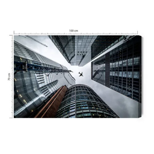Obraz na płótnie Samolot i wieżowce Perspektywa  Premium Canvas