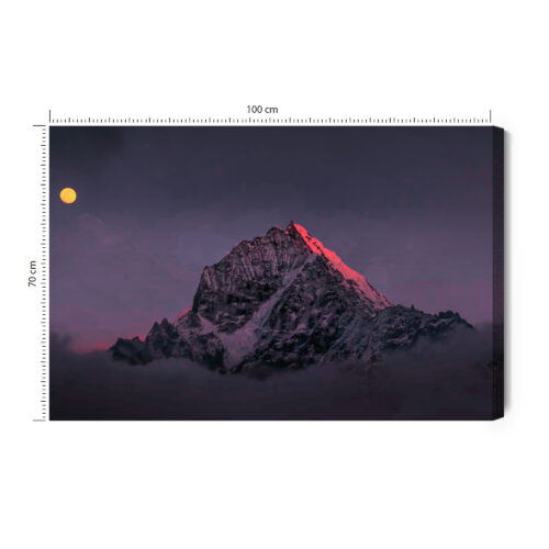 Obraz na płótnie Góry Ośnieżony szczyt o zmierzchu z pełnią Premium Canvas