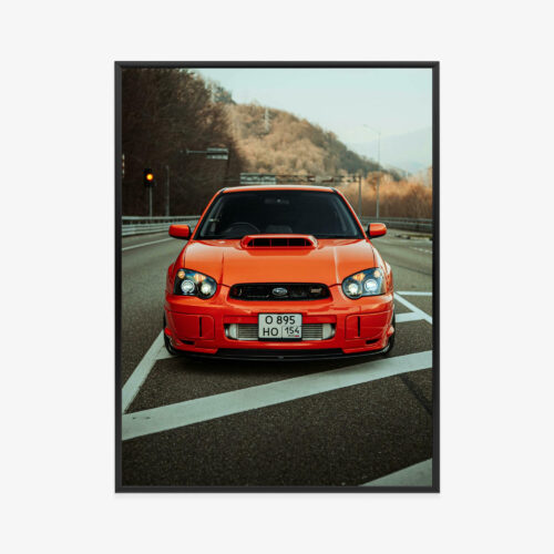 Plakat w ramie czerwonego sportowego auta na drodze Premium